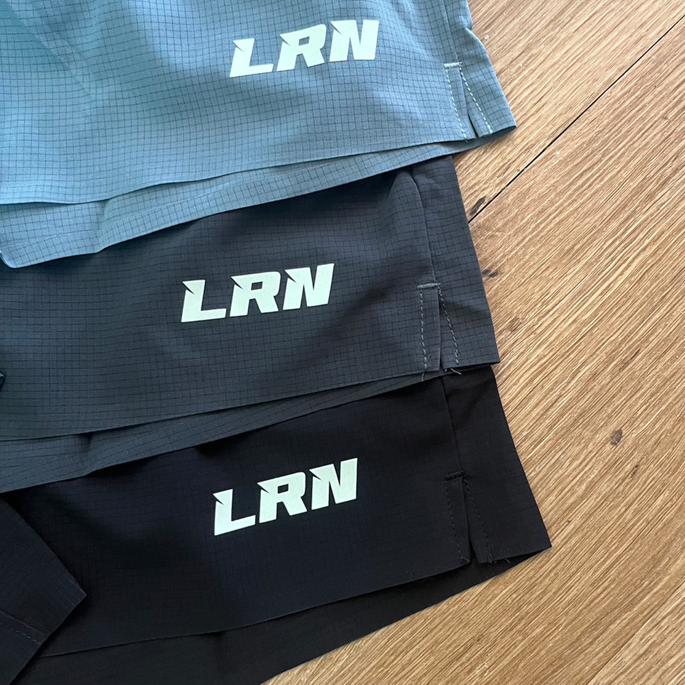 กางเกงวิ่งเทรล 2" (ไม่มีซับใน) ใส่ได้ทั้งชาย - หญิง มีกระเป๋าใส่ของที่รอบเอวในตัว (F34)