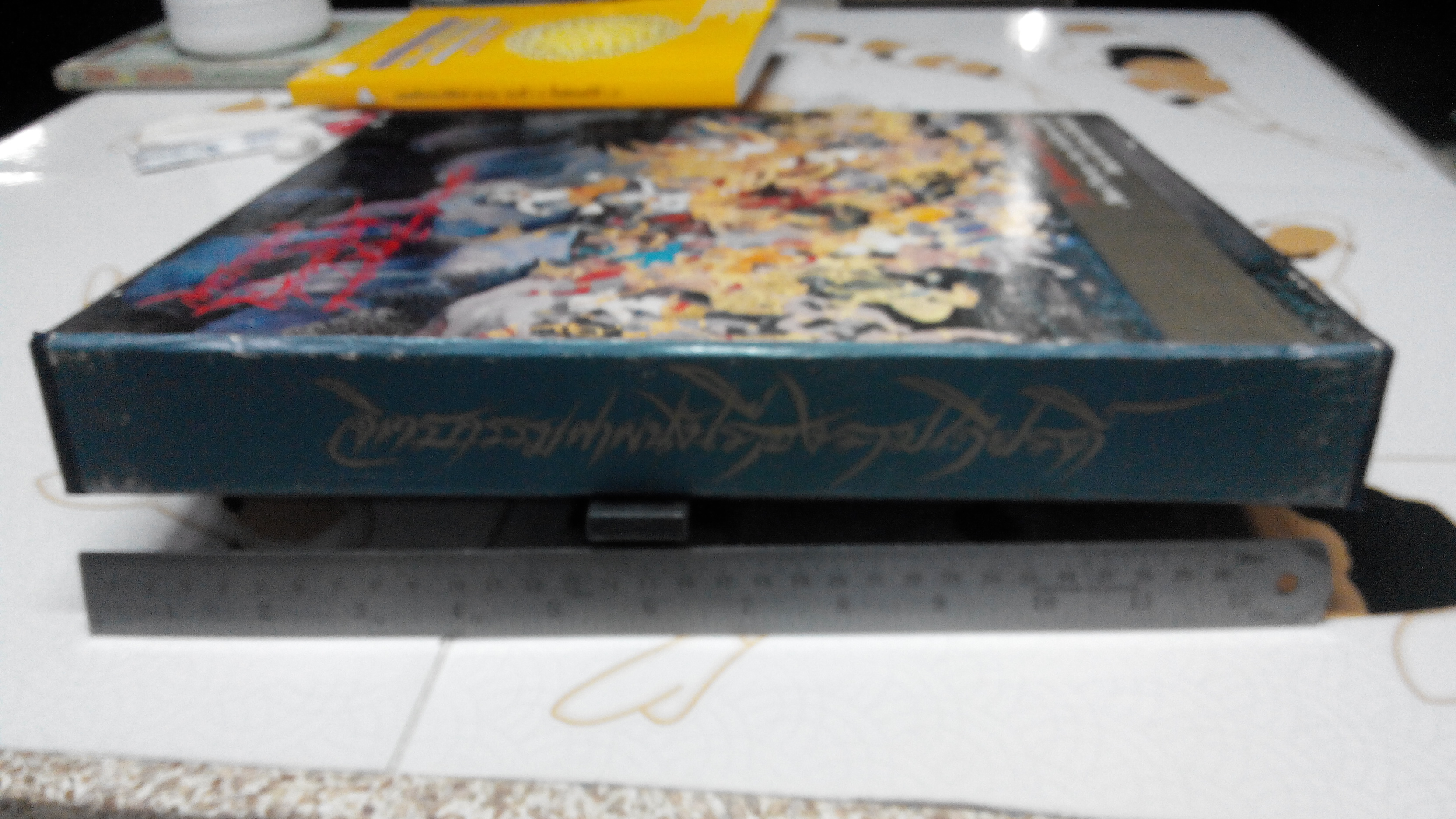 จิตรกรรมฝาผนังเรื่องรามเกียรติ์ รอบพระระเบียง วัดพระศรีรัตนศาสดาราม ( The Ramayana - Mural paintings along the galleries of the temple of The Emerald Budha ) หนังสือปกแข็ง มีใบหุ้มปก พร้อมกล่อง