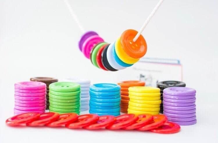 ของเล่นเสริมทักษะ กระดุมหรรษา