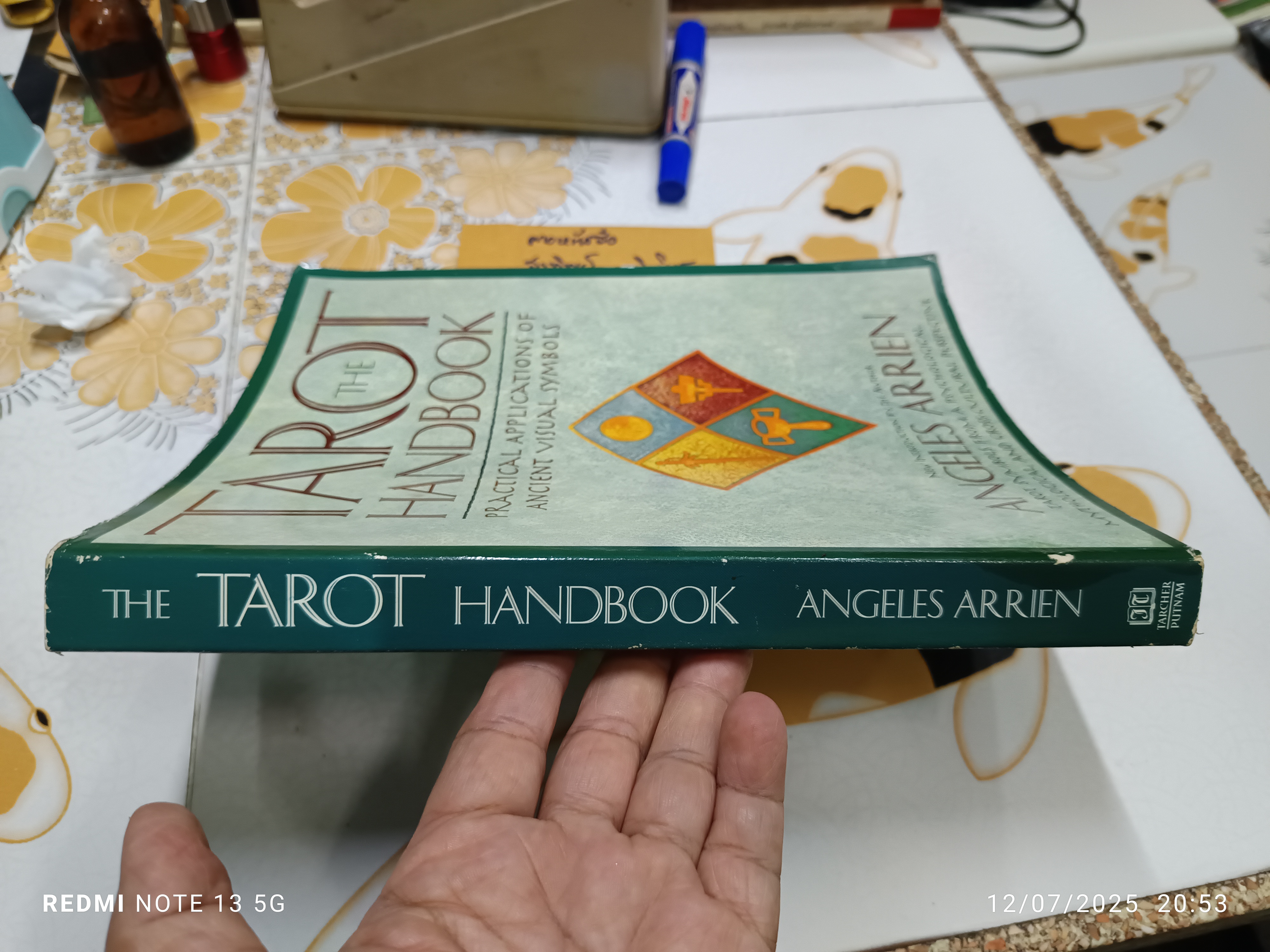 The Tarot Handbook เขียนโดย Angeles Arrien 1997