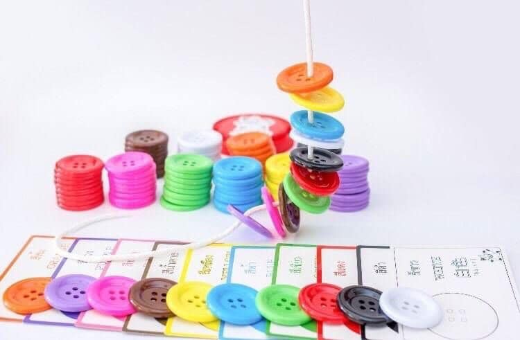 ของเล่นเสริมทักษะ กระดุมหรรษา