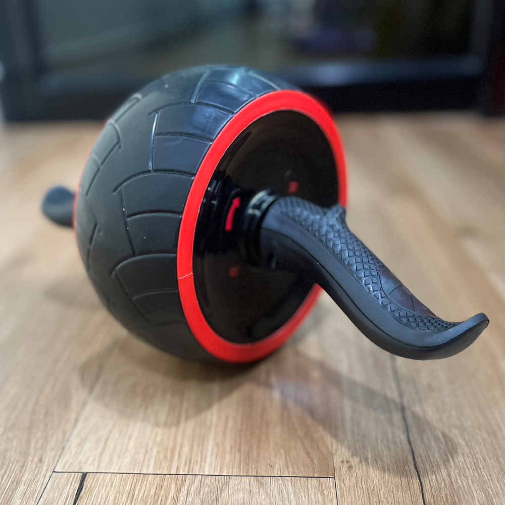 ลูกกลิ้งบริหารหน้าท้อง ฝึกกล้ามท้อง ด้านในลูกล้อมีสปริงในตัว ช่วยให้ง่ายในจังหวะดึงตัวกลับ (J8)