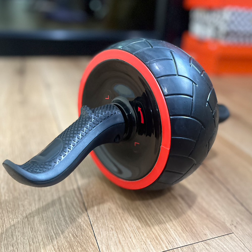 ลูกกลิ้งบริหารหน้าท้อง ฝึกกล้ามท้อง ด้านในลูกล้อมีสปริงในตัว ช่วยให้ง่ายในจังหวะดึงตัวกลับ (J8)