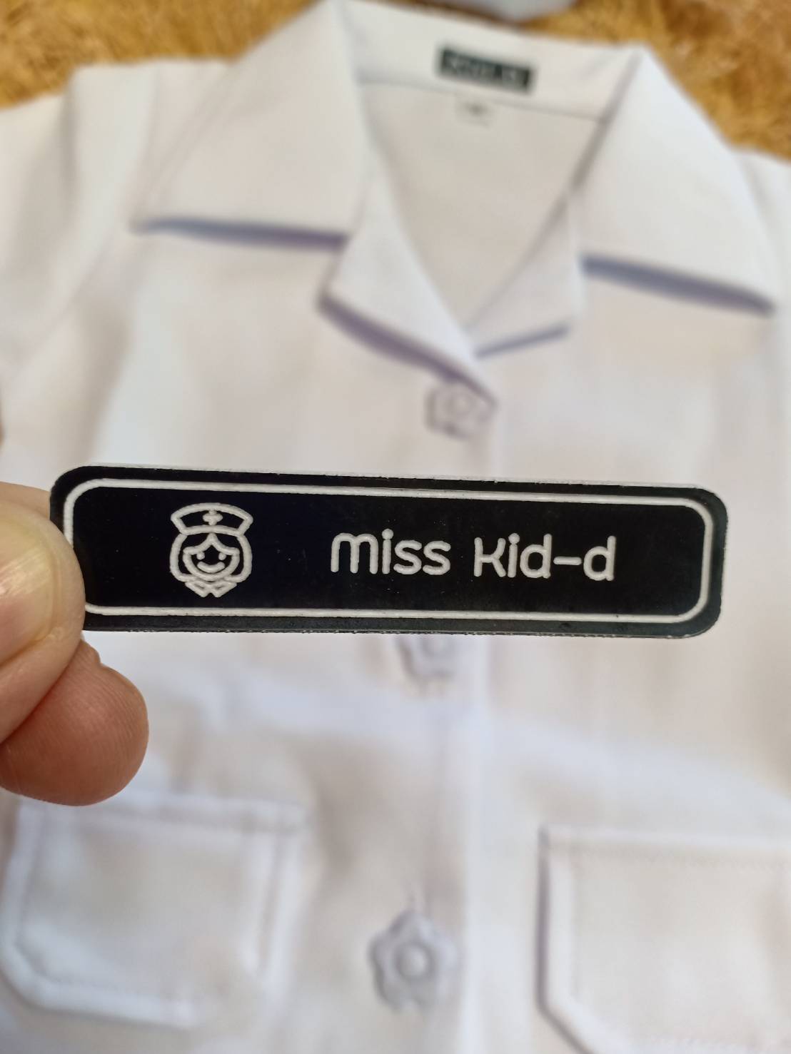 ชุดพยาบาลเด็ก กระดุมดอกไม้