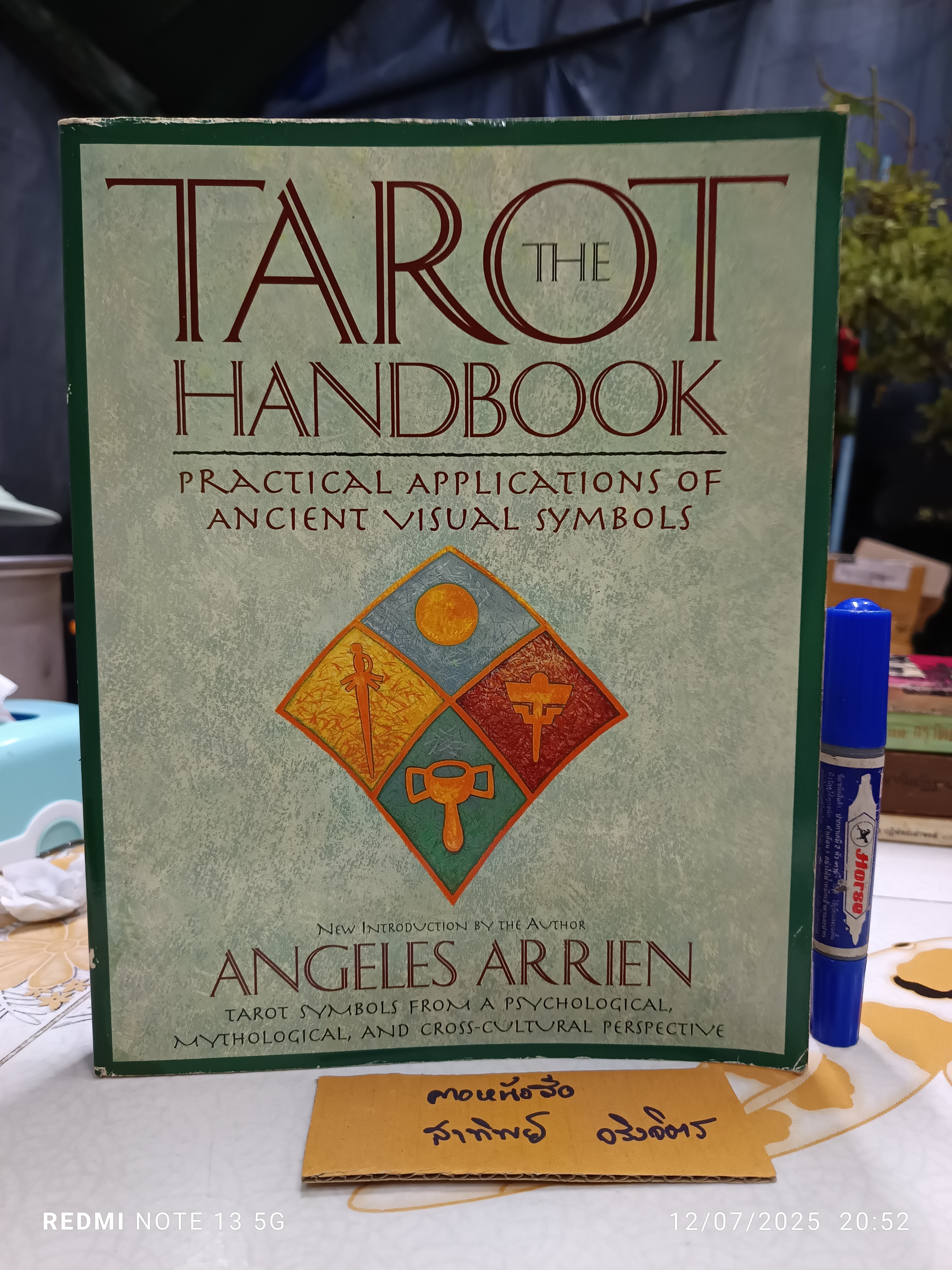 The Tarot Handbook เขียนโดย Angeles Arrien 1997