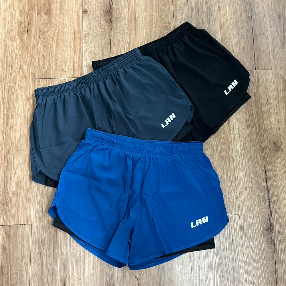 กางเกงวิ่งมาราธอน 2-in-1 โลโก้เรืองแสง (F26)