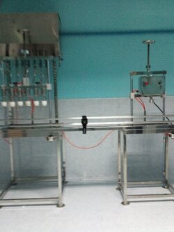 เครื่องบรรจุขวดน้ำดื่มกึ่งอัติโนมัติ6หัวพร้อมเครื่องปิดฝา